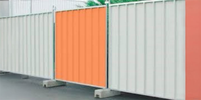 GI fencing with pre-cast cement blocks for industrial site security